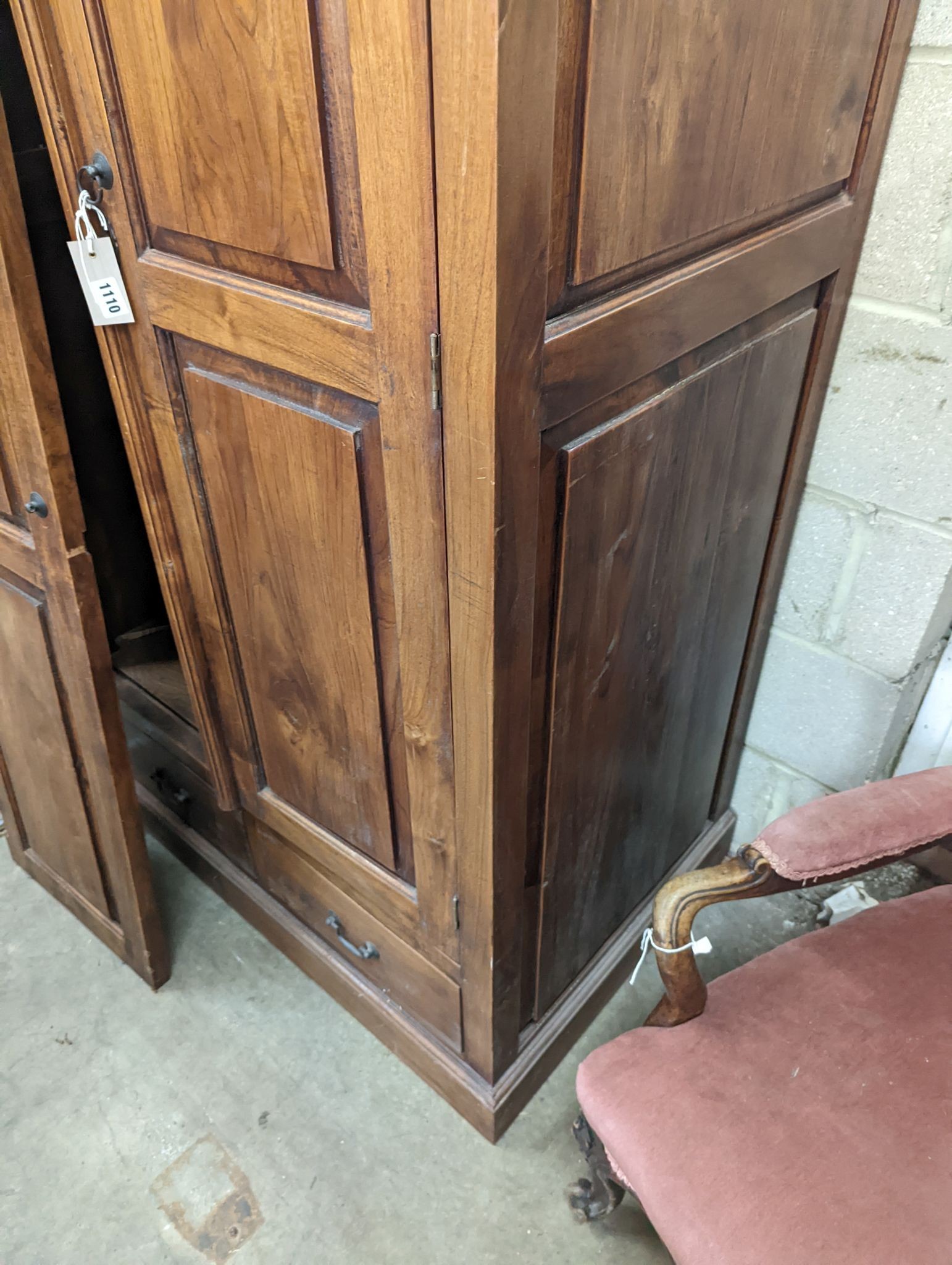 An Indonesian hardwood 2 door wardrobe (damaged), length 100cm, depth 66cm, height 200cm